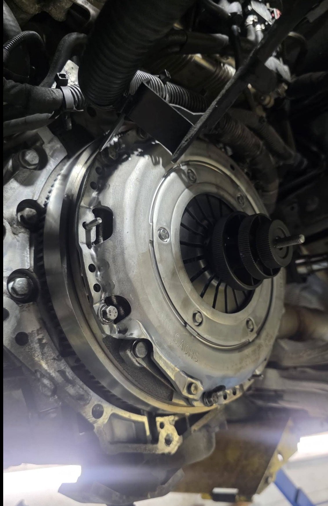 Close-up of a clutch assembly during a workshop repair